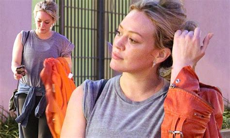 hilary duff shows off her trim physique in leggings and