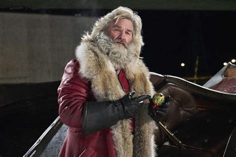 review sexy santa kurt russell is coming for cynics in