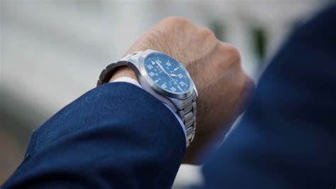 businessman       hand watching  time stock