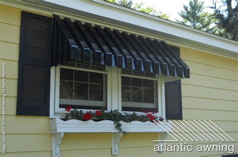 pin  julee  storm damage   residential awnings aluminum awnings house exterior