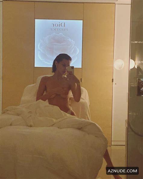 bella hadid topless photos promoting dior skincare on