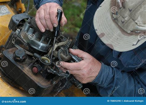 repairing lawn mower engine stock photo image  garden lawnmower