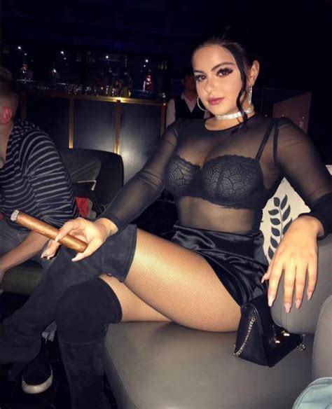 ariel winter posts her sexiest picture ever as she wears sheer top and knee high boots during