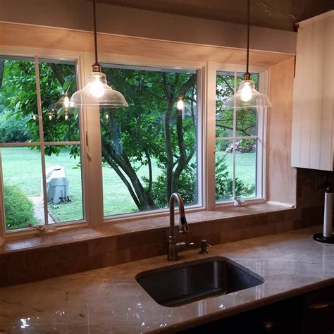 triple unit picture  casement windows opens   kitchen sink area custom bu