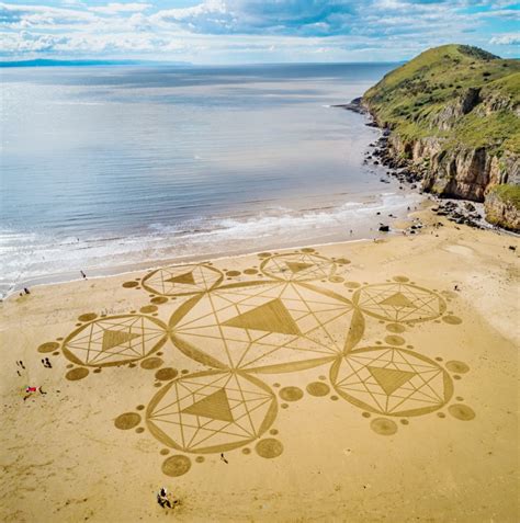 brean drone  show incredible sand art spanning  metres