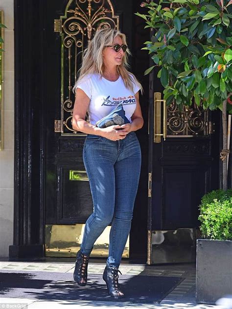carol vorderman shows off her curves in very tight jeans in london