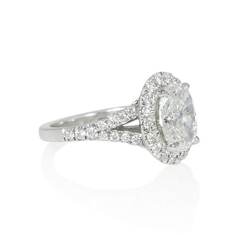 Oval Halo And Diamond Split Shank Engagement Ring For Emily Cynthia Britt