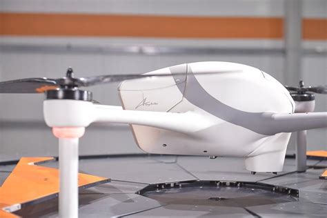 airobotics battery swapping platform  drones flying   clock