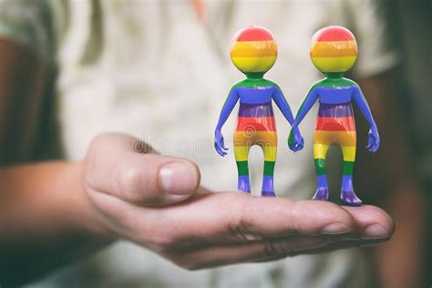 rainbow flag couple holding hands stock image image of rainbow