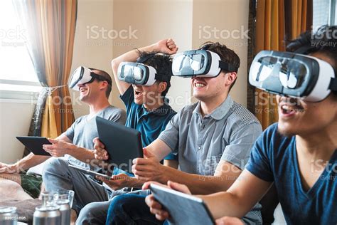 Group Of Friends Playing Games Using Virtual Reality