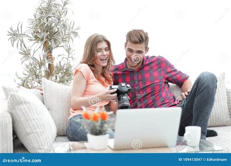 Young Couple Makes Viewing Photos In Photo Camera Stock Image Image