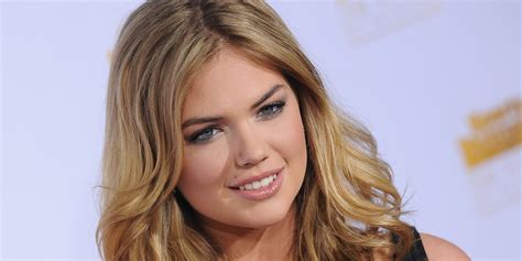 kate upton and her boobs defy gravity as she stars in zero gravity sports illustrated swimwear