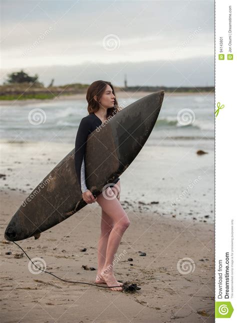 female surf girl looking at small waves stock image image of sultry