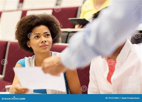 teacher giving test  student girl  lecture stock photo image