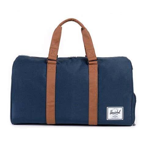 herschel  duffle bag accessories  cho fashion  lifestyle uk