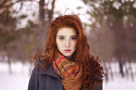 looking at viewer pale grey coat winter scarf portrait freckles