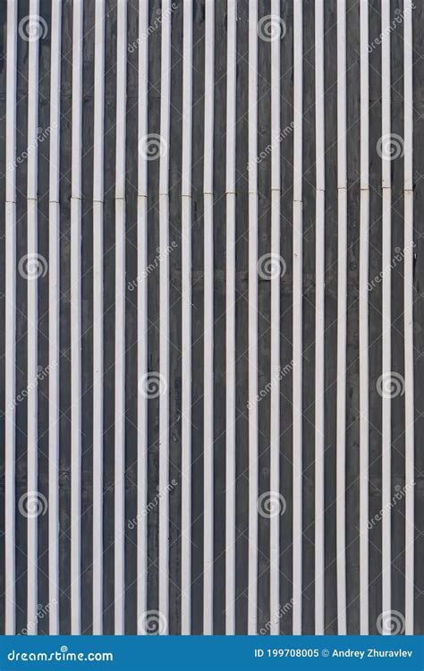 wall background  vertical metal lines  industrial style stock image image  panel bench