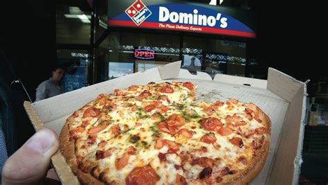 dominos pizza imposes   cent surcharge  sunday orders  australia stuffconz