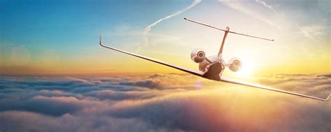 private airplane jetliner flying  clouds  beautiful sunset light