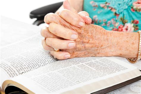 Praying Senior Hands On Bible Stock Image Image Of