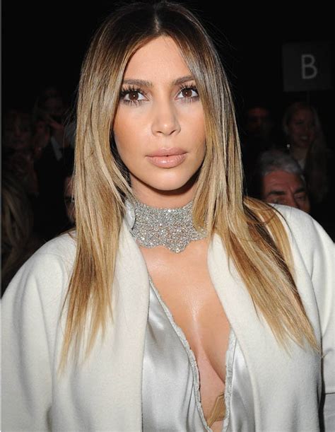 kim kardashian exposes nude plunge bra in cleavage flashing silver