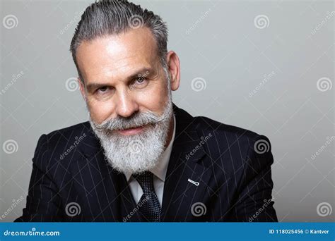 portrait  attractive middle aged bearded gentleman wearing trendy