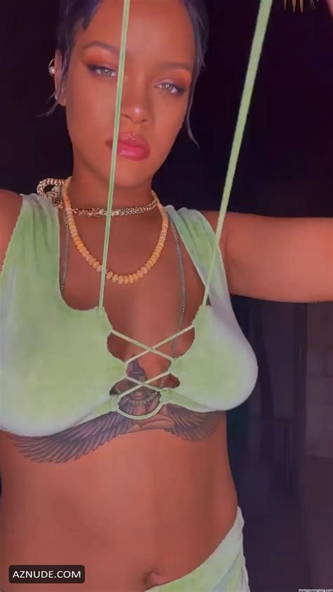 rihanna sexy shows off her tits and butt in green lingerie
