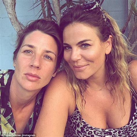 fiona falkiner flaunts hourglass frame in busty cut out swimsuit