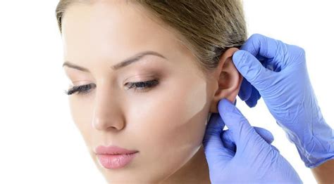 unhappy   ears otoplasty    impression med spa