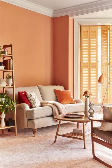 coral coloured living room paint living room orange colourful living