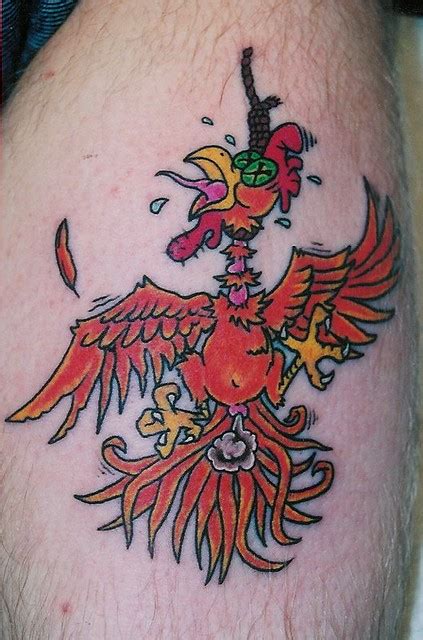 cock that hangs below the knee tattoo flickr photo
