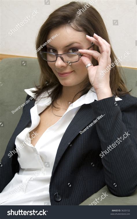 attractive brunette business woman wearing business stock