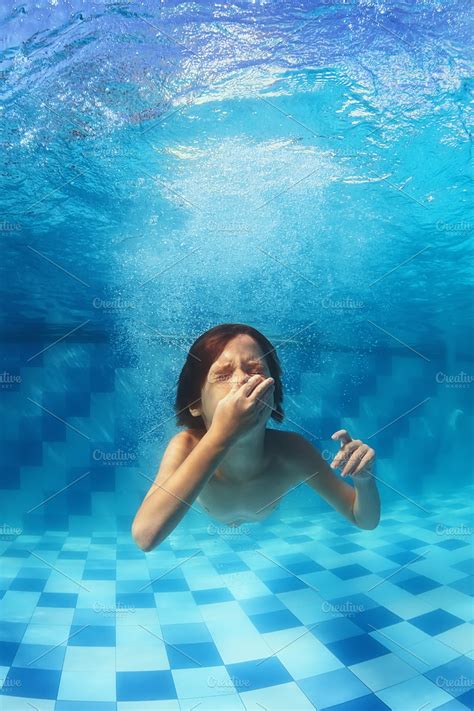 child jump  swim underwater sports  creative market