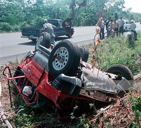 The Wreckage Of A Sport Utility Vehicle That Was Carrying
