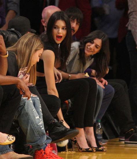 kendall jenner looks far from impressed sitting courtside for