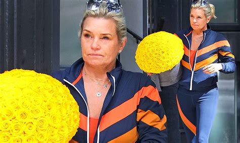 yolanda hadid rocks sporty navy tracksuit while delivering a bouquet to