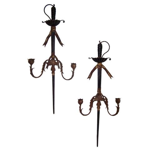 pair of large tole sword sconces at 1stdibs