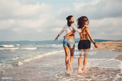 lesbian couple full body photos and premium high res pictures getty