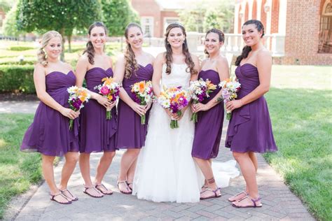 this bride went with short purple dresses for her bridesmaids