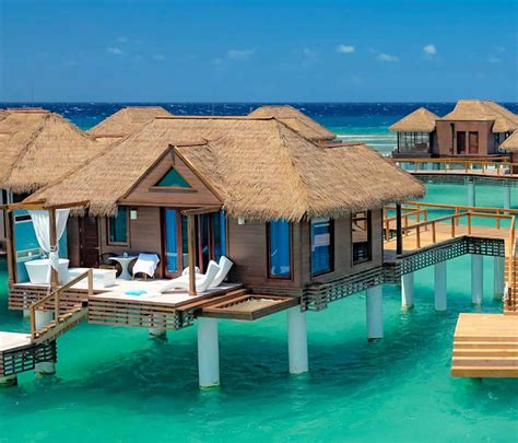 Discover Tropical Romance In 3 Overwater Bungalow Resorts