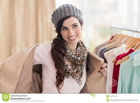 pretty brunette taking off her jacket stock image image of spending shop 45711415