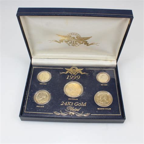kt gold plated coin set property room