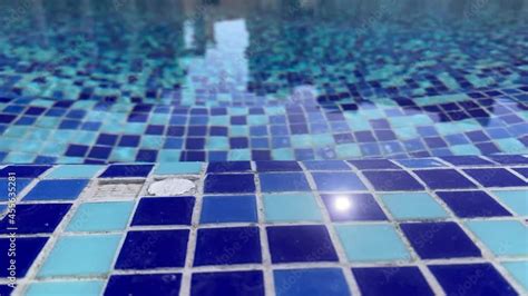 Empty Swimming Pool With Calm Water Daylight Reflection And Clear Water