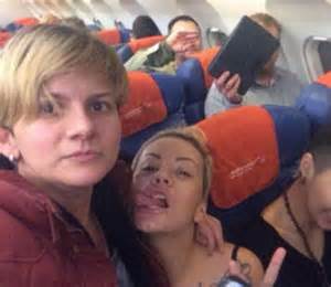 police raid gay club run by lesbian who took kissing selfie infront
