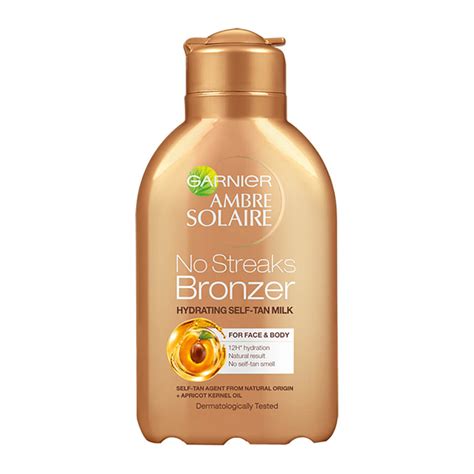 ambre solaire  streaks bronzer  tan lotion ml  shipping lookfantastic