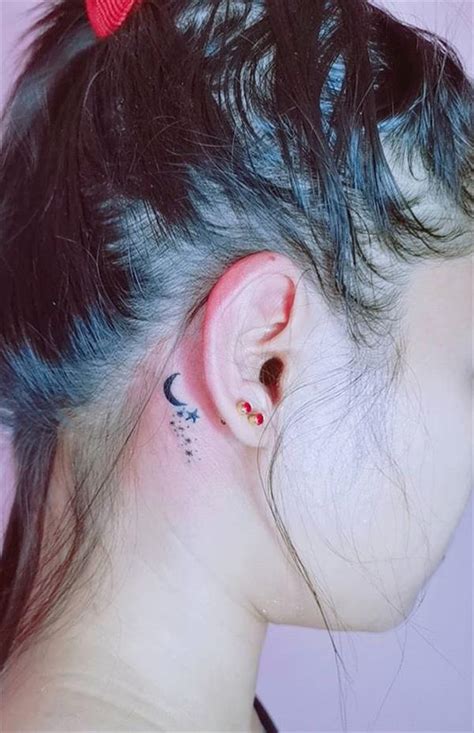 fashionable female tattoo designs   ear cozy living