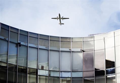 plane  curved building stock photo image  airplane