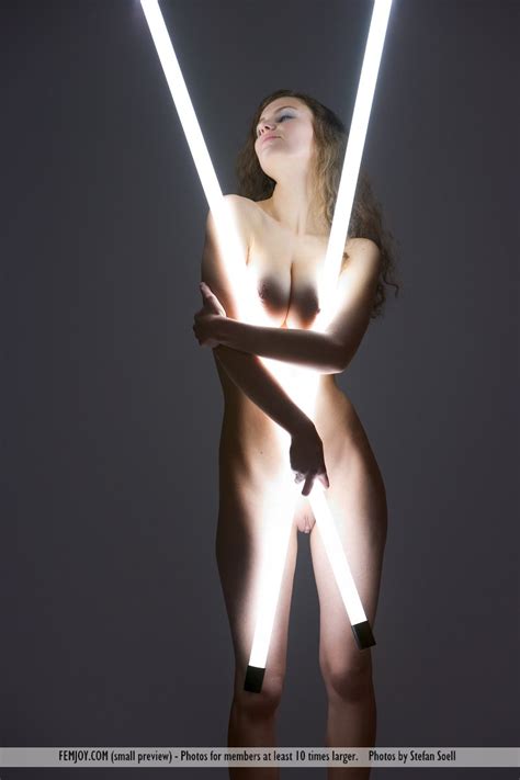 euro babes db naked babe holding light tubes