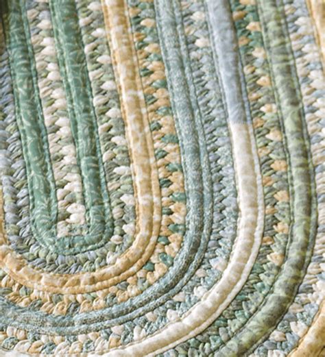 oval braided rug    beige plowhearth