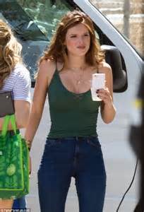 Bella Thorne Sports Cleavage Baring Vest Top As She Continues Filming